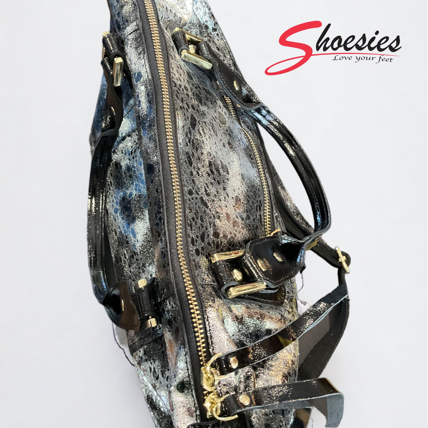 Fashion Leather Handbag. Beautiful Silver and Black highlighted.